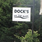 Small sign Dock's on the River Motel & Cabins